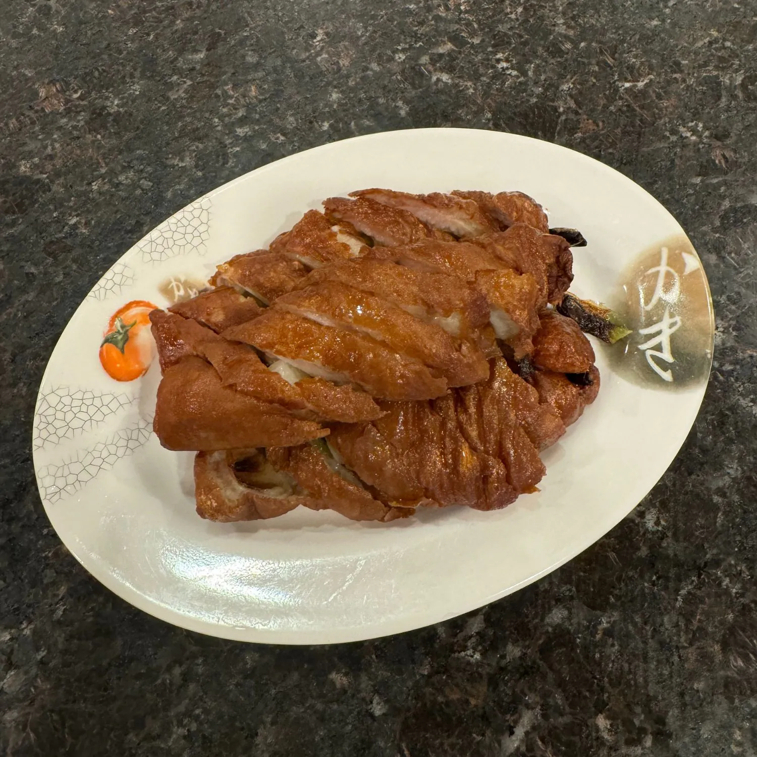 Crispy-skinned roast duck with glossy texture and savory flavor at China Palace Restaurant, a Chinese Restaurant in Milpitas