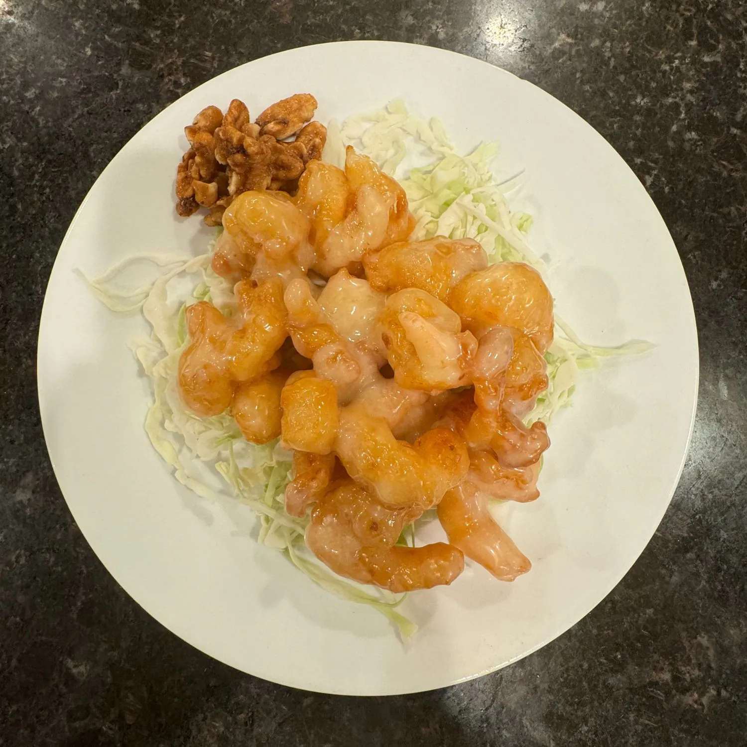 Crispy shrimp coated in sweet cream sauce, served with walnuts at China Palace Restaurant, a Chinese Restaurant in Milpitas
