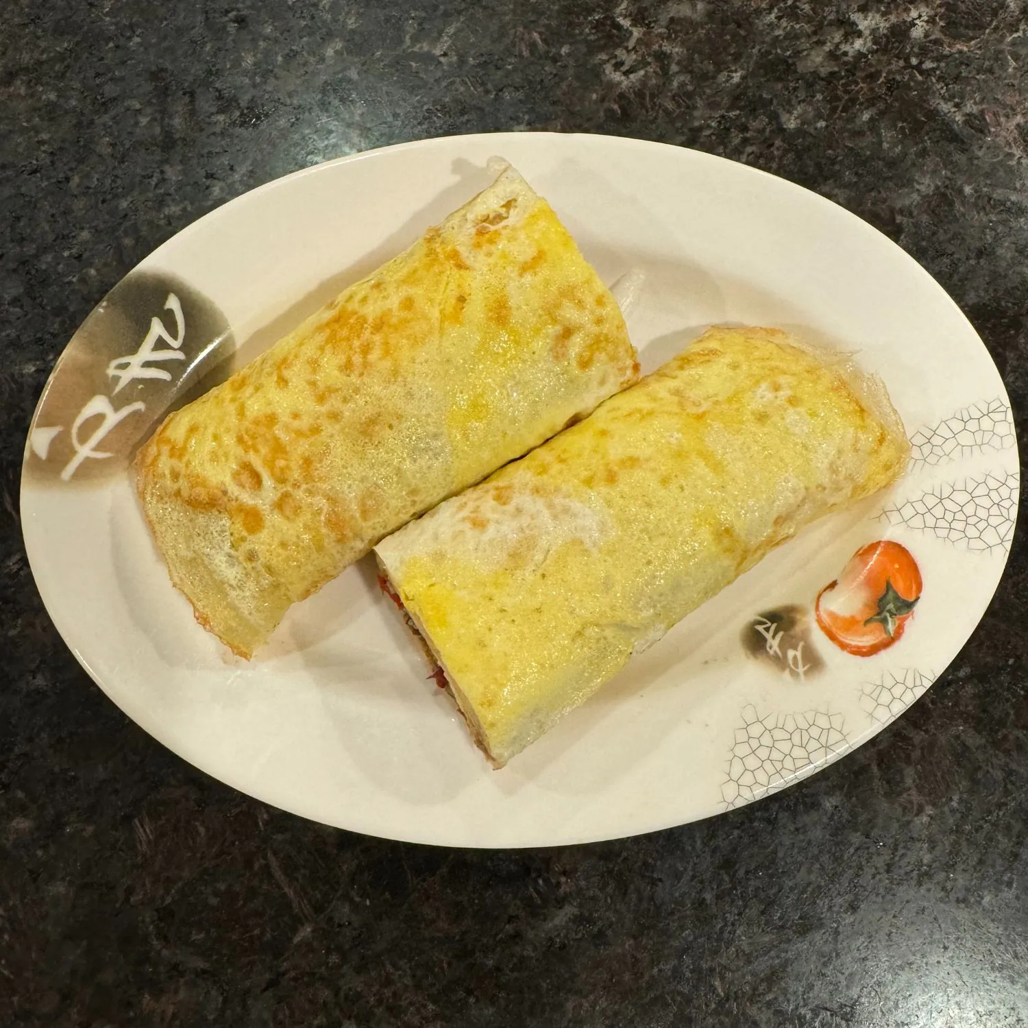 Soft egg wrap rolled with savory fillings, golden and fragrant at China Palace Restaurant, a Chinese Restaurant in Milpitas